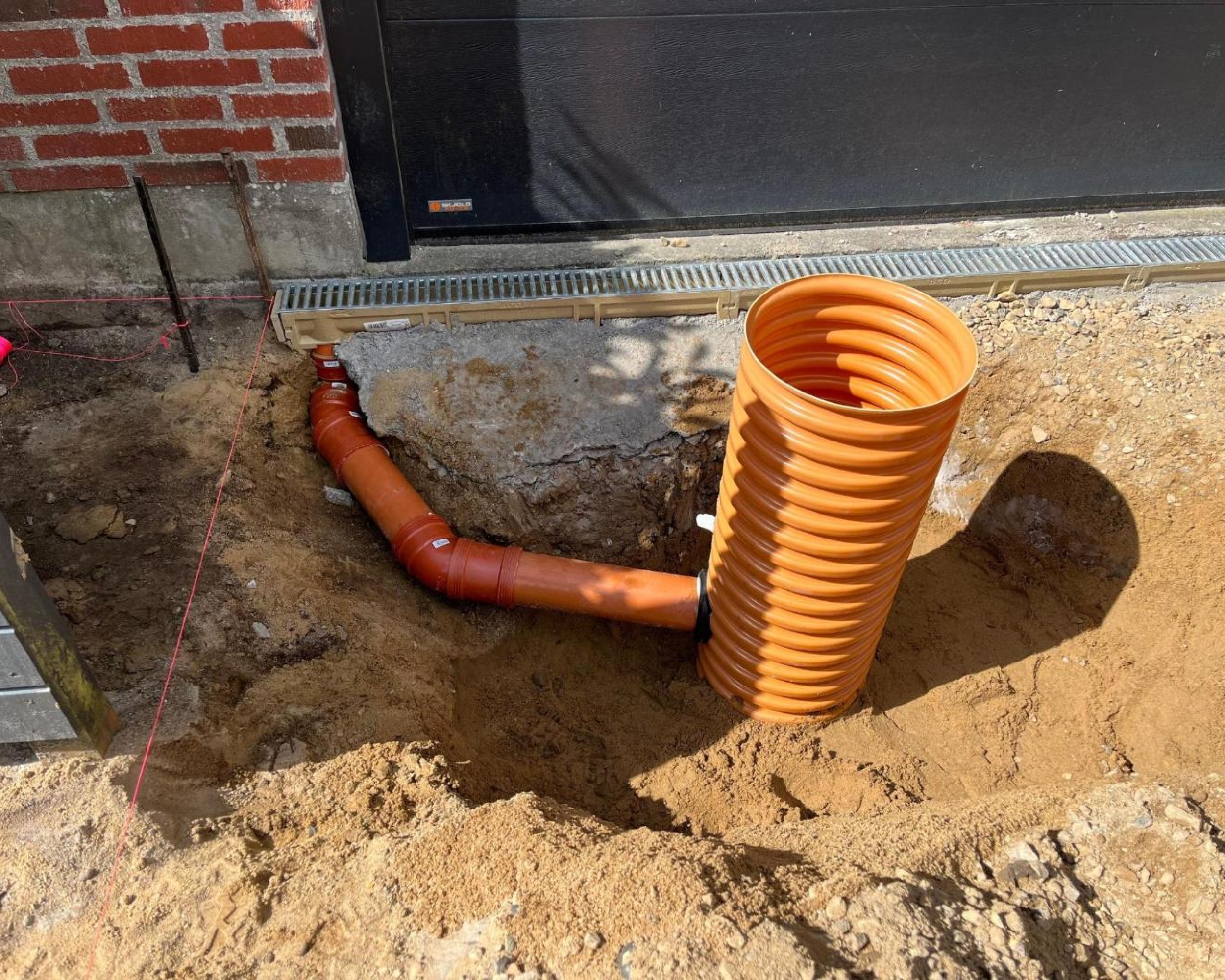 Entreprenør til nedgravning af rør